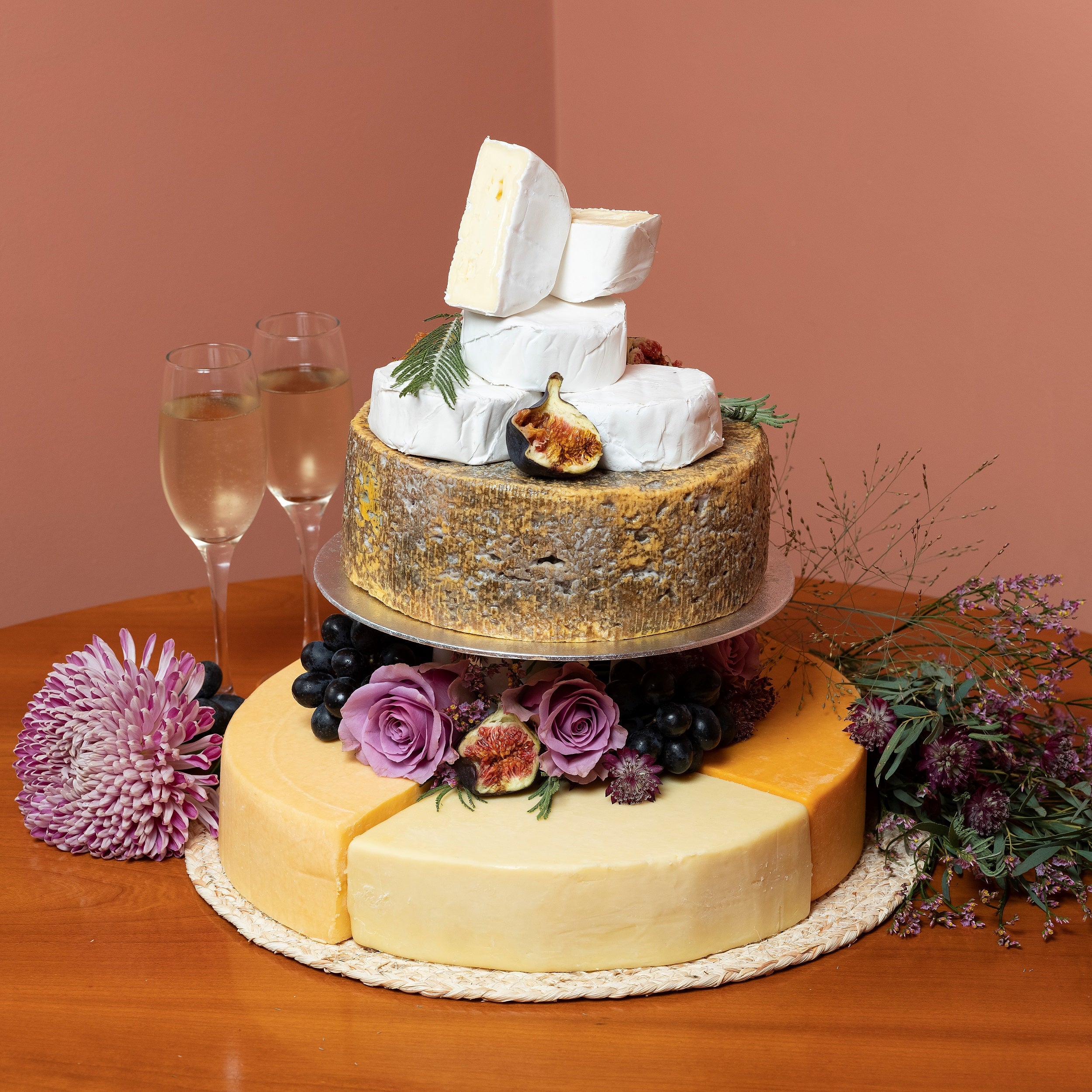 Large cheese wedding cake of our handmade Lancashire cheeses. A cheese tower of hard, soft, goat's and blue cheese.