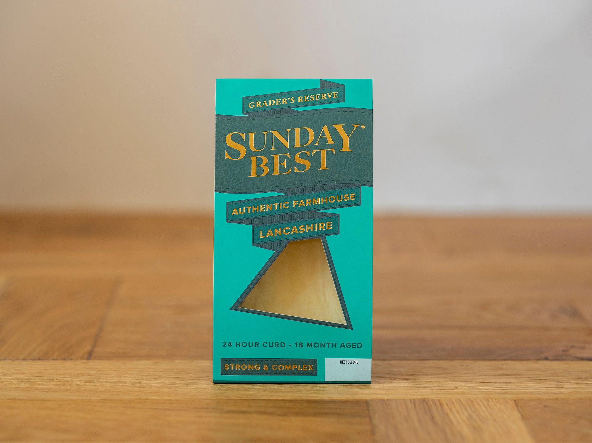 Sunday Best in it's packagin on a wooden surface. Our award-winning British farmhouse cheese.